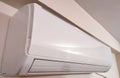 Split air conditioner on a white wall. Closeup image Royalty Free Stock Photo