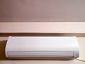 Split air conditioner on a white wall. Closeup image Royalty Free Stock Photo