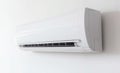 Split air conditioner on a white wall. Closeup image. Generative AI Royalty Free Stock Photo
