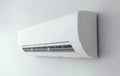 Split air conditioner on a white wall. Closeup image. Generative AI Royalty Free Stock Photo