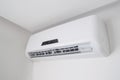 Split air conditioner on a white wall in flat indoors Royalty Free Stock Photo