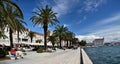 People on the Splitska Riva promenade in Split on early spring day, Croatia