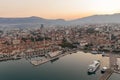 Split, Croatia - Aug 14, 2020: Aerial drone shot of Diocletian Palace by port riva in old town before sunrise in morning Royalty Free Stock Photo