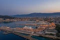 Split, Croatia - Aug 14, 2020: Aerial drone shot of Ferry Port in old town before sunrise in early monring Royalty Free Stock Photo