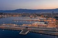 Split, Croatia - Aug 14, 2020: Aerial drone shot of Ferry Port in old town before sunrise in early monring Royalty Free Stock Photo