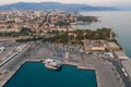 Split, Croatia - Aug 13, 2020: Aerial drone shot of old town harbour for ferry cruise in sunset hour Royalty Free Stock Photo