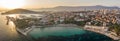 Split, Croatia - Aug 13, 2020: Aerial panoramic drone shot of Bavice city beach during sunset hour in summer Royalty Free Stock Photo