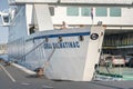 Split, Croatia - Aug 15, 2020: Tourists and cars board on jadrolinija liner ferry at old port in morning Royalty Free Stock Photo