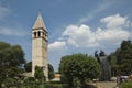 Statue of Gregorius of Nin Grgur Ninski and the Bell-tower of Saint-Rainier Benedictine Monastery, Split, Dalmatia, Croatia. Royalty Free Stock Photo