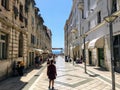 A crowd of tourists walking down the main street of marmontova street in Split, Croatia.