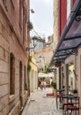 Split. Croatia - June 5, 2019: Women on a shopping trip in the old part of the European city with stone houses, lanterns, cafes Royalty Free Stock Photo
