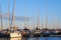 Split, Croatia - October 3, 2010: White sea yachts parked in a harbour on the Adriatic Sea. Sunset at the seaport