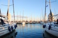 Split, Croatia - October 3, 2010: White sea yachts parked in a harbour on the Adriatic Sea. Sunset at the seaport. Generali logo Royalty Free Stock Photo