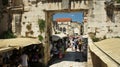 Split, Croatia - 07/22/2015 - Ruins of historic city, old walls and Eastern Silver Gate view, sunny day, Dalmatia