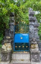 Split gate with guards at Ulun Danu Beratan Temple, Bedoegoel, Bali Indonesia