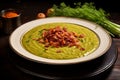 Split pea soup with bacon garnish Royalty Free Stock Photo