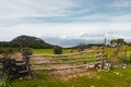 A split rail fence along a countryside field. Royalty Free Stock Photo