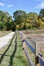 Rail Fence and Autumn Path Royalty Free Stock Photo