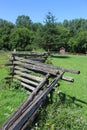 Split Rail Fence Zigzags across a Green Field Royalty Free Stock Photo