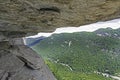 A split rock frames a mountain on Chimney Rock. Royalty Free Stock Photo