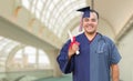 Split Screen of Hispanic Male As Graduate and Nurse On Campus or At Hospital