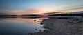 Split-screen sunrise as sky meets water at Blue Marsh Lake in Berks County, PA