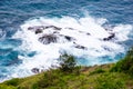 Splits Waves Against Rocks In Sea