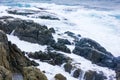 Splits Waves Against Rocks In Sea