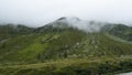 Spluegenpass with the Monte Spluga reservoir and surrounding mountains in summer Royalty Free Stock Photo