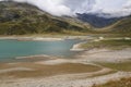 Spluegenpass with the Monte Spluga reservoir and surrounding mountains in summer Royalty Free Stock Photo