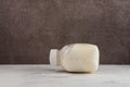 Spoiled curdled milk, bloated bottle. Concept - Improper storage of food. Expired dairy and fermented milk products that are