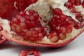 Spoiled pomegranate and apples on a white background Royalty Free Stock Photo