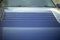 Spoiler on car. Blue hood. Transport details Royalty Free Stock Photo