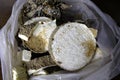 Spoilt rotten sliced Nigerian white yam to be thrown away