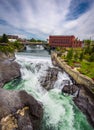 Falls and the Washington Water Power building along the Spokane River