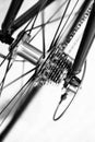 Spoked bicycle wheel and cassette gears in motion Royalty Free Stock Photo