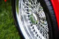 Spoked shiny wheel in classic car Royalty Free Stock Photo