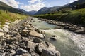 Spol river with church of Santa Maria in Livigno Italy