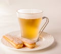 Sponge biscuits and beer on plate