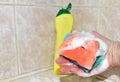 Sponge with detergent and foam while washing. Cleaning Kitchen, bathroom or toilet. Wash dishes and plumbing. Abrasive sponges for