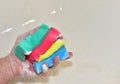 Sponge with detergent and foam while washing. Cleaning Kitchen, bathroom or toilet. Wash dishes and plumbing. Abrasive sponges for