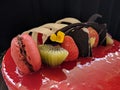 Sponge pieces on a table neatly arranged, served to visitorsStrawberry mousse cake served with topping strawberries, kiwi fruit an Royalty Free Stock Photo