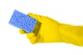 Sponge for washing dishes in a female hand. Hand in a yellow glove isolated on a white background Royalty Free Stock Photo