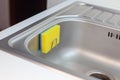 Sponge for washing dishes. Storage ideas, sink in the kitchen.