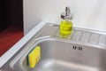 Sponge for washing dishes. Storage ideas, sink in the kitchen.