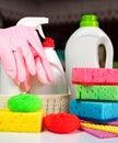 Sponges, rubber gloves and natural detergents and cleaners products in the basket. Cleaning service concept. Annual spring Royalty Free Stock Photo