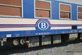 View on ancient historical train wagon on sidetrack with logo lettering of belgian national railway company