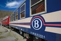 View on ancient historical train wagon on sidetrack with logo lettering of belgian national railway company