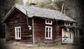 Spooky abandoned house with several irregular chimneys at Vithatten in Sweden Royalty Free Stock Photo