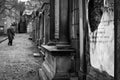 A spooky black and white photograph taken in a graveyard